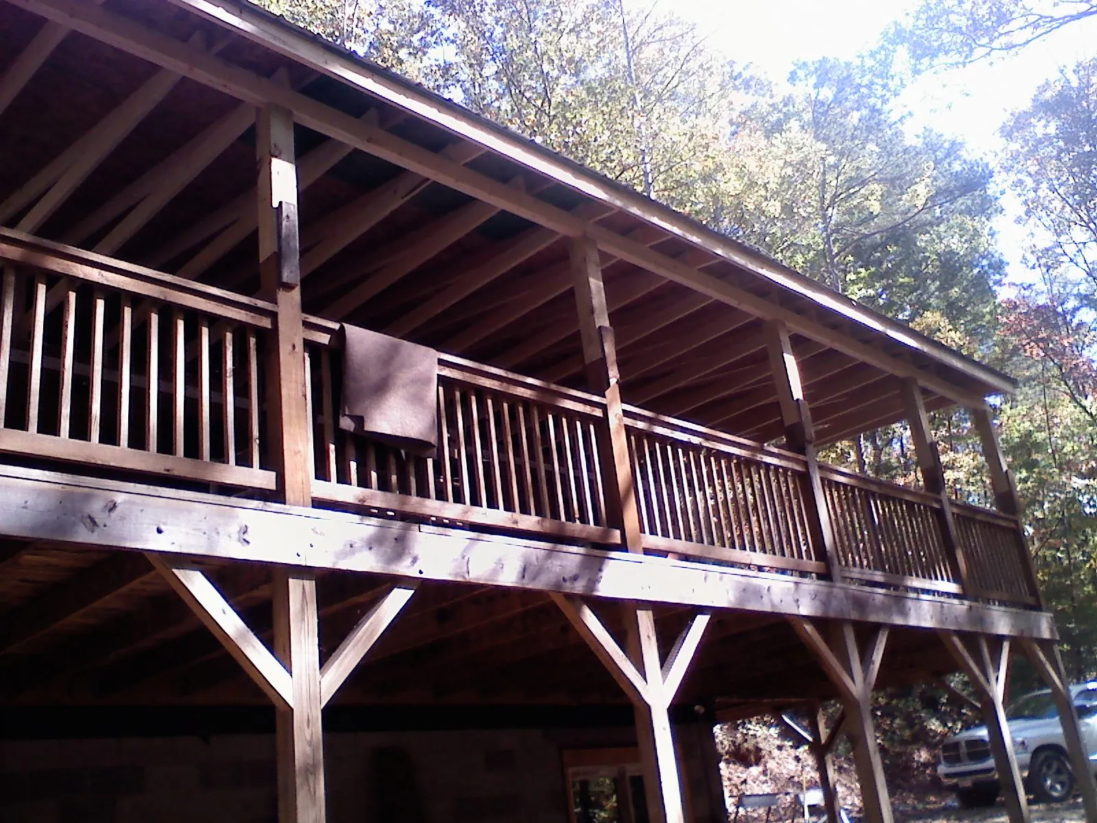 Timber framing under a new elevated porch and deck — Roof Leak Repair in Bay Shore by Roofing Brothers